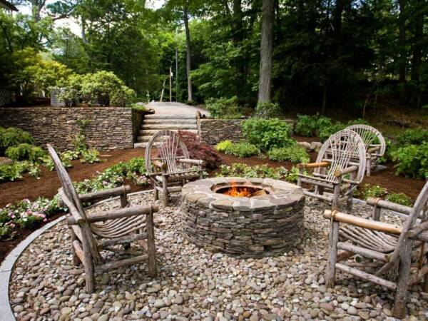 Rustic Paver Patio with Stone Firepit